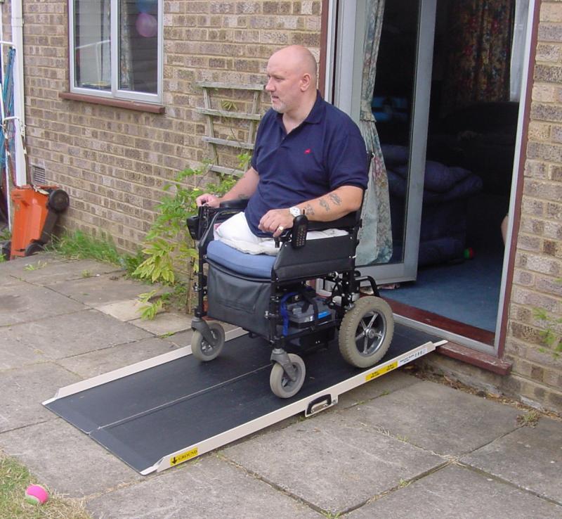 Portable House ramp for wheelchair mobility